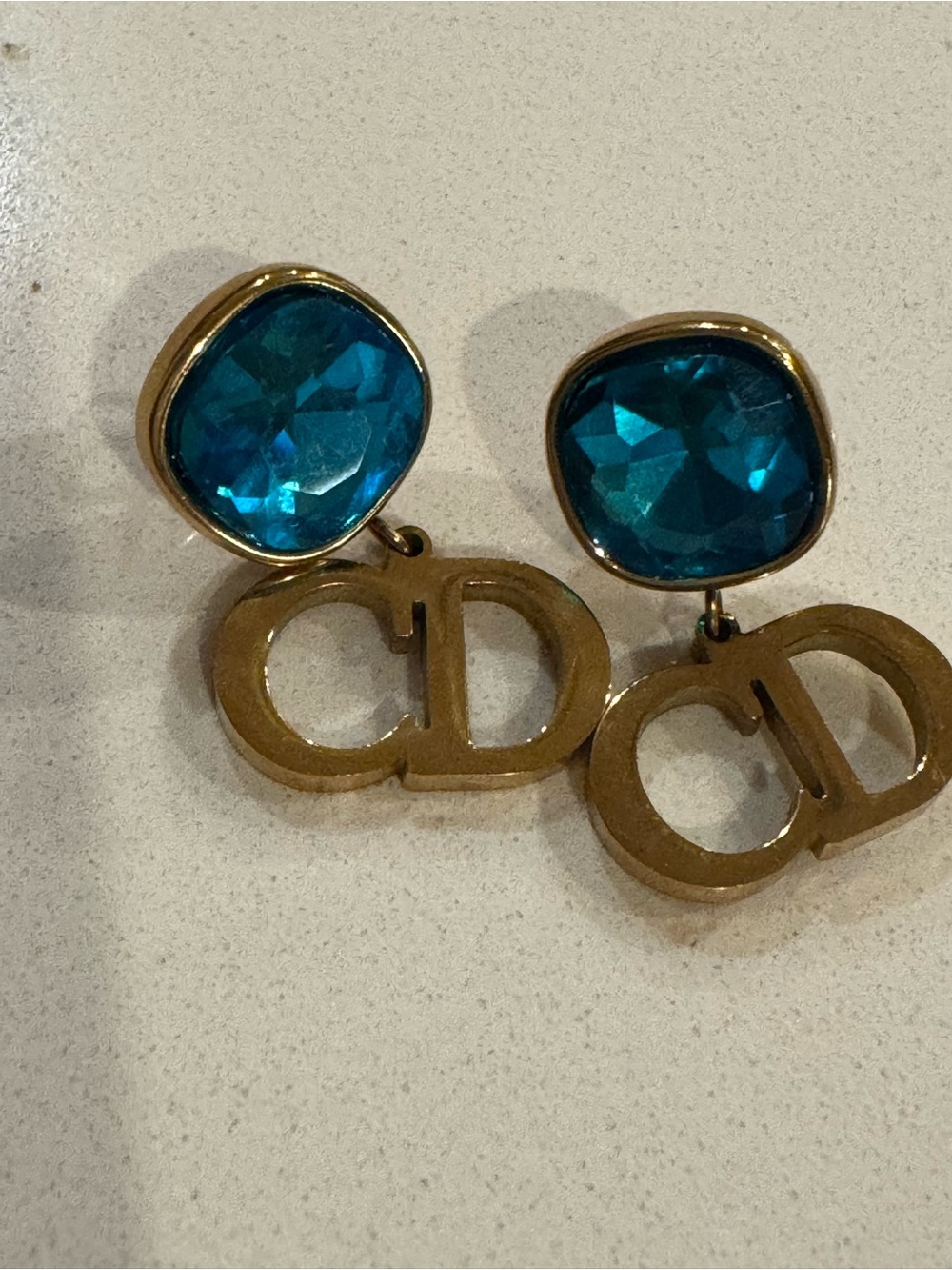 Gold-Tone Drop Earrings with Blue Crystal and Double Charm